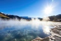 steam rising from a large geothermal hot spring Royalty Free Stock Photo