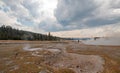 Steam rising off Black Warrior hot springs geyser and Hot Lake in Yellowstone National Parks Lower Geyser Basin in Wyoming USA Royalty Free Stock Photo