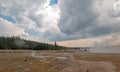 Steam rising off Black Warrior hot springs geyser and Hot Lake in Yellowstone National Parks Lower Geyser Basin in Wyoming USA Royalty Free Stock Photo