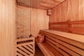 Steam room in the bathhouse, a place where people warm up for health and cleanliness inside there is a table and a soft light