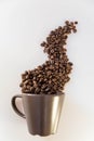 Steam shaped coffee beans and mug Royalty Free Stock Photo