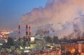 Steam and smoke from the chimneys and cooling towers