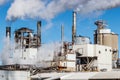 Steam and smoke emitting from an industrial factory smokestack I