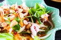 steam squid eggs salad with spicy lemon juice soup, samui thailand