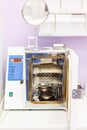Steam sterilizer autoclave with the door open in a medical laboratory or clinic