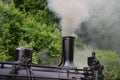 Steam train engine, upper part with the front chimney Royalty Free Stock Photo