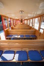 Steam train inside car pasenger benches