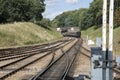 Steam Train leaving Staion; England Royalty Free Stock Photo