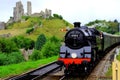 Steam Train passing Corfe Castle Royalty Free Stock Photo