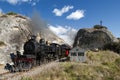 Steam train passing Frog Rock, Canterbury, New Zealand Royalty Free Stock Photo