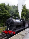 Steam Train at platform at Oxenhope Railway Station on Keighley and Worth Valley Railway. Yorkshire, England, UK,