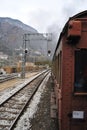 Steam train on railroad Royalty Free Stock Photo