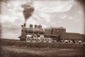 Steam train in vintage sepia Royalty Free Stock Photo