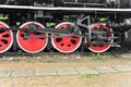 Steam train wheels in red color Royalty Free Stock Photo