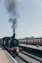 Steam trains departs Sheringham station, Nortfolk, UK