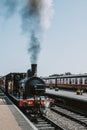 Steam trains departs Sheringham station, Nortfolk, UK