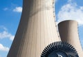 Steam turbine against a nuclear power plant Royalty Free Stock Photo