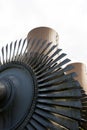 Steam turbine against a nuclear power plant Royalty Free Stock Photo