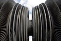 Steam turbine of nuclear power plant against sky and clouds Royalty Free Stock Photo