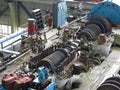 Steam turbine in repair process, machinery, pipes, tubes, at pow Royalty Free Stock Photo