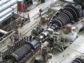 Steam turbine in repair process, machinery, pipes, tubes, at pow Royalty Free Stock Photo