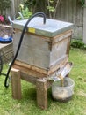 Steam Wax Extractor in use extracting beeswax from honey frames.