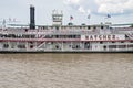 Steamboat Carries Passengers in New Orleans Harbor