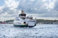 Steamboat or ferryboat carries passengers in the Bosphorus. Transport ferry in Istanbul. Historical Kadikoy ferry port.