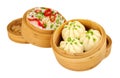 Steamed bao buns in bamboo steamers