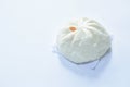 Steamed bao Chinese bun stuffing mashed pork and salt egg on white background Royalty Free Stock Photo