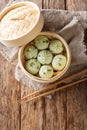 Steamed baozi chinese buns in bamboo steamer closeup. Vertical top view Royalty Free Stock Photo