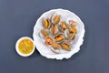 Steamed blanched clams with seafood sauce Royalty Free Stock Photo