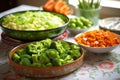 steamed broccoli, carrots and peas as a side dish on a bright dining table