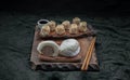 Steamed buns with minced pork filling and Pork shumai or Chinese steamed dumpling served with sour sauce Royalty Free Stock Photo