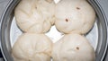 4 steamed buns in a steamer for eating, playing Royalty Free Stock Photo