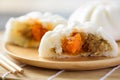 Steamed buns stuffed with minced pork and salted egg