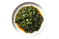 Steamed Callaloo Jamaican Cuisine. On A White Plate Royalty Free Stock Photo