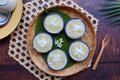 Steamed Cassava cake top with coconut at top view - Thai dessert called Kamon Mun