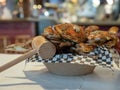 Steamed Chesapeake Bay blue crabs covered in seasoning sitting in paper bowl with mallet Royalty Free Stock Photo