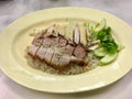 Steamed chicken and crispy pork rice