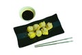 Steamed Chinese dumpling filling minced shrimp or dim sum dipping soy sauce on plate