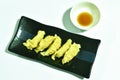 Steamed Chinese  dumpling stuffed mashed shrimp and pork dipping soy sauce on plate Royalty Free Stock Photo