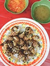 Steamed conch with sauces, Vietnam