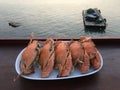 Steamed crabs plate by a tropical beach