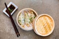 Steamed dumplings Gyoza in bamboo steamer with soy sauce Royalty Free Stock Photo