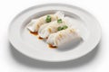 Steamed dumplings with soy sauce isolated on white background.