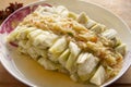 Steamed eggplant with garlic sauce close up. Chinese food Royalty Free Stock Photo