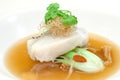 Steamed fillet of cod on a bed of vegetables Royalty Free Stock Photo