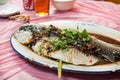 Steamed fish in black bean and soy sauce at Hong Kong restaurant Royalty Free Stock Photo