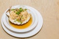 Steamed fresh scallop with clamp shell in Chinese meal